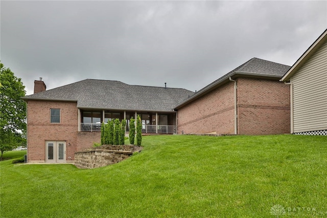 3085 State Route 122, Springboro, OH 45005 - back of property featuring a chimney, brick siding, a lawn, and roof with shingles