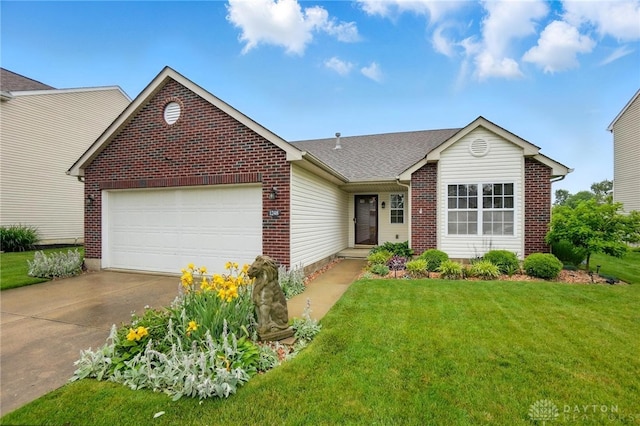 1248 Kern Dr, Germantown, OH 45327 - view of front of house featuring driveway, brick siding, an attached garage, a front lawn, and a shingled roof