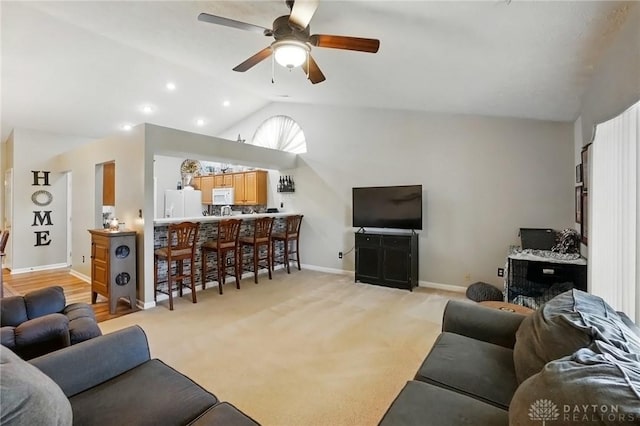 1248 Kern Dr, Germantown, OH 45327 - living room with lofted ceiling, baseboards, and ceiling fan