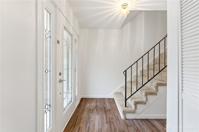 4513 Silver Oak St, Dayton, OH 45424 - entryway featuring wood finished floors, baseboards, and stairway