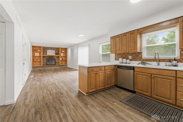 4513 Silver Oak St, Dayton, OH 45424 - kitchen featuring stainless steel dishwasher, a sink, light countertops, wood finished floors, and recessed lighting