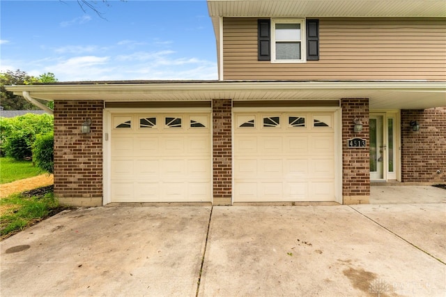 4513 Silver Oak St, Dayton, OH 45424 - garage featuring concrete driveway