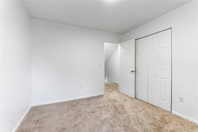 4513 Silver Oak St, Dayton, OH 45424 - unfurnished bedroom featuring carpet flooring, baseboards, and a closet