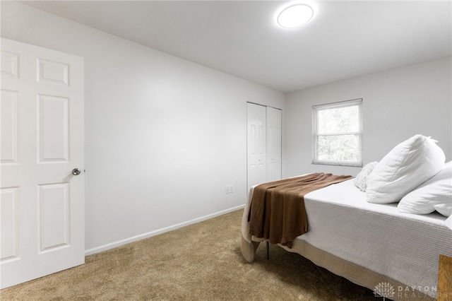 4513 Silver Oak St, Dayton, OH 45424 - bedroom with carpet flooring, a closet, and baseboards