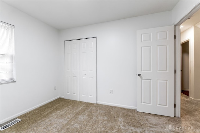 4513 Silver Oak St, Dayton, OH 45424 - unfurnished bedroom with carpet, a closet, and baseboards