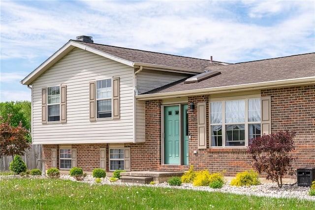 9673 Dayton Greenville Pike, Brookville, OH 45309 - tri-level home with brick siding and roof with shingles