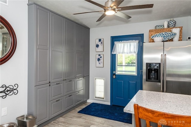 9673 Dayton Greenville Pike, Brookville, OH 45309 - entryway with ceiling fan, light wood-type flooring, and baseboards