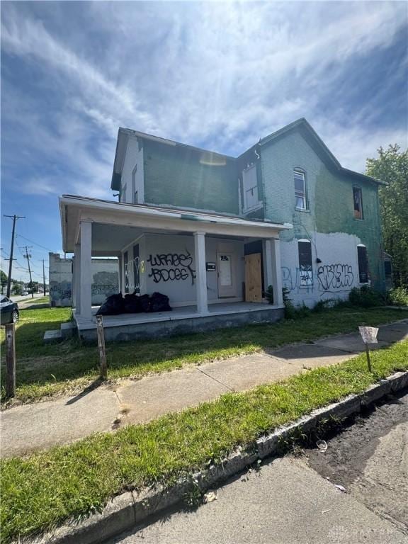 2300 E 3rd St, Dayton, OH 45403 - view of front of house featuring covered porch