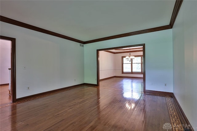 7299 Country Club Ln, West Chester, OH 45069 - unfurnished room with a chandelier, crown molding, wood-type flooring, and baseboards