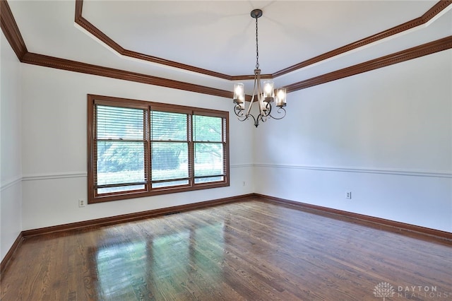 7299 Country Club Ln, West Chester, OH 45069 - unfurnished room with a chandelier, wood finished floors, a tray ceiling, baseboards, and crown molding