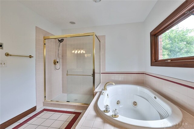 7299 Country Club Ln, West Chester, OH 45069 - full bathroom featuring a whirlpool tub, a stall shower, tile patterned floors, and baseboards