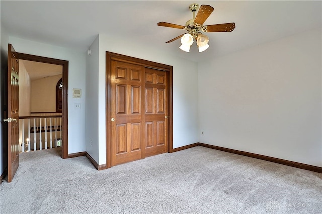 7299 Country Club Ln, West Chester, OH 45069 - unfurnished bedroom with carpet, a closet, baseboards, and ceiling fan