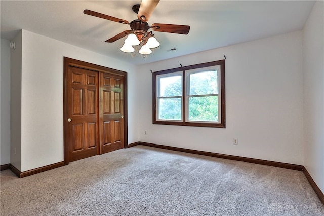 7299 Country Club Ln, West Chester, OH 45069 - unfurnished bedroom featuring carpet flooring, baseboards, a closet, and a ceiling fan