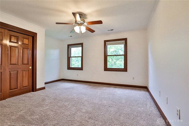 7299 Country Club Ln, West Chester, OH 45069 - carpeted empty room with baseboards and a ceiling fan