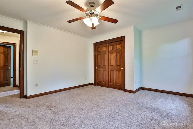 7299 Country Club Ln, West Chester, OH 45069 - unfurnished bedroom with carpet flooring, baseboards, a closet, ceiling fan, and ornamental molding