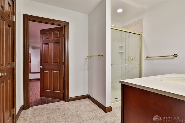 7299 Country Club Ln, West Chester, OH 45069 - bathroom featuring a shower stall, baseboards, vanity, recessed lighting, and tile patterned flooring