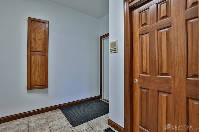 7299 Country Club Ln, West Chester, OH 45069 - foyer featuring baseboards and light tile patterned floors