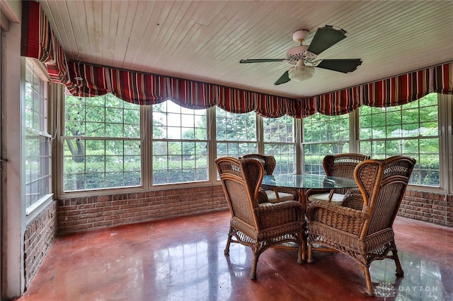 7299 Country Club Ln, West Chester, OH 45069 - sunroom / solarium with brick wall, healthy amount of natural light, wooden ceiling, and concrete flooring