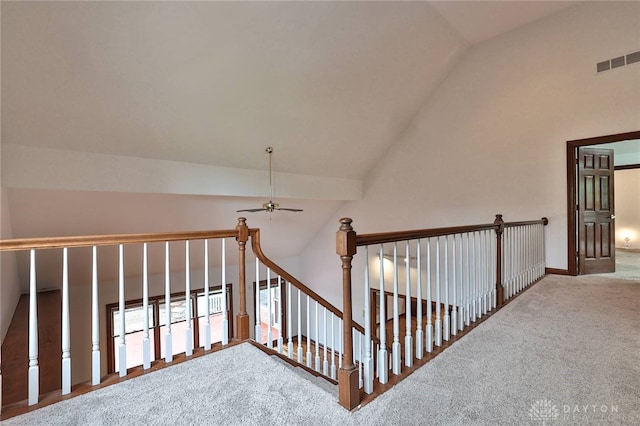 7299 Country Club Ln, West Chester, OH 45069 - staircase featuring vaulted ceiling, ceiling fan, carpet flooring, and baseboards