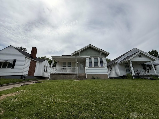 1805 Fauver Ave, Dayton, OH 45420 - view of front of property with a porch and a front yard