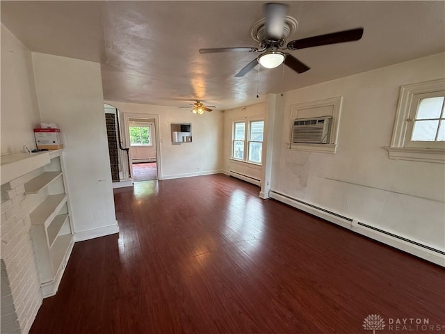 1805 Fauver Ave, Dayton, OH 45420 - unfurnished living room featuring a baseboard heating unit, dark wood-style flooring, a ceiling fan, and baseboard heating