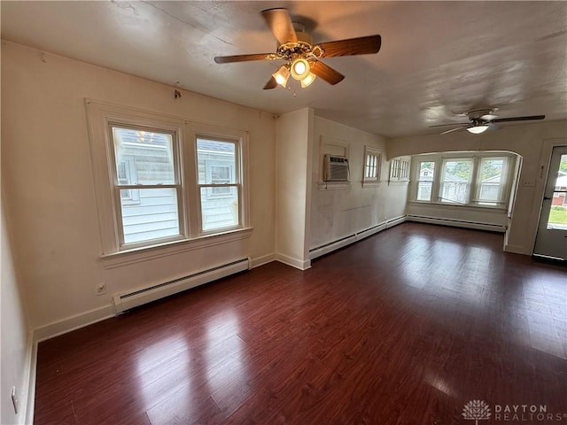1805 Fauver Ave, Dayton, OH 45420 - unfurnished living room with baseboard heating, ceiling fan, and dark wood-type flooring