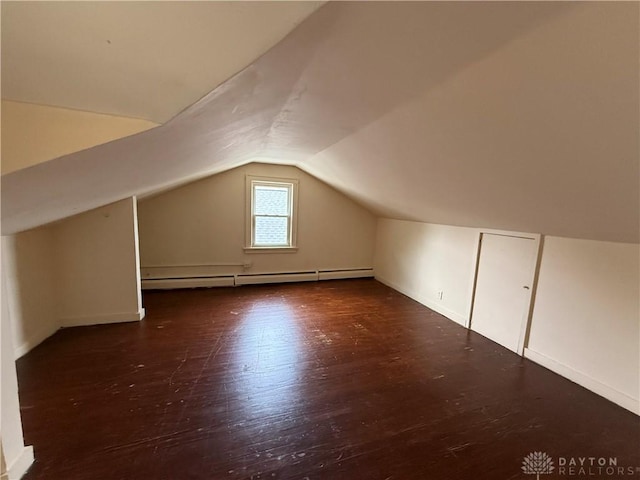 1805 Fauver Ave, Dayton, OH 45420 - additional living space featuring a baseboard heating unit, lofted ceiling, baseboards, and wood finished floors