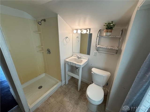 1805 Fauver Ave, Dayton, OH 45420 - bathroom with toilet, a shower stall, tile patterned floors, and baseboards