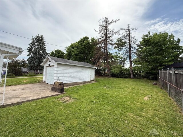 1805 Fauver Ave, Dayton, OH 45420 - view of yard with a garage and an outbuilding