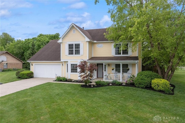 2866 Fence Stone Ct, Dayton, OH 45458 - traditional home featuring a porch, concrete driveway, a garage, and a front yard