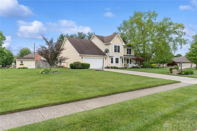 2866 Fence Stone Ct, Dayton, OH 45458 - view of front of home with driveway, a front yard, and an attached garage