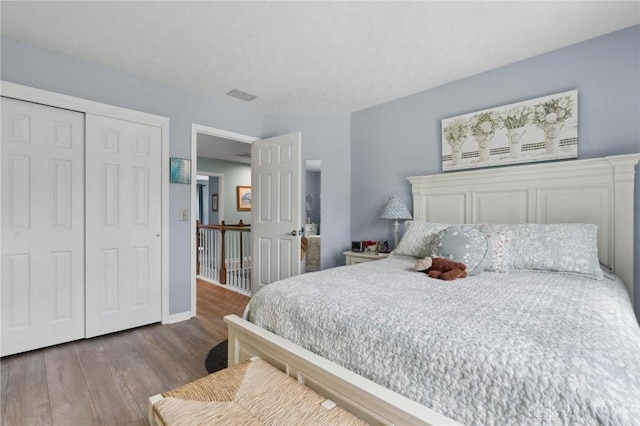 2866 Fence Stone Ct, Dayton, OH 45458 - bedroom with wood finished floors, a closet, and baseboards