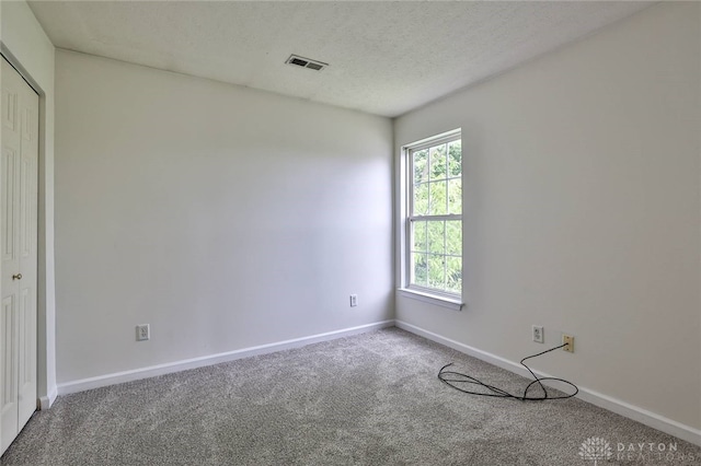 510 Delaware Xing, Trenton, OH 45067 - carpeted empty room featuring baseboards and a textured ceiling