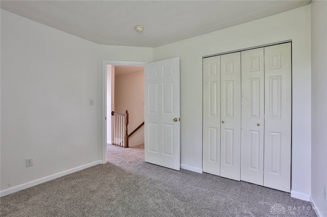 510 Delaware Xing, Trenton, OH 45067 - unfurnished bedroom with carpet flooring, baseboards, and a closet