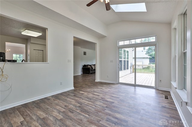 510 Delaware Xing, Trenton, OH 45067 - empty room with healthy amount of natural light, dark wood-type flooring, lofted ceiling, a skylight, and ceiling fan