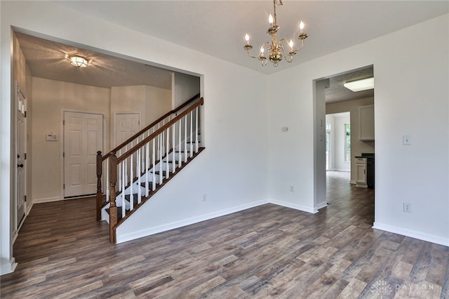 510 Delaware Xing, Trenton, OH 45067 - foyer featuring dark wood-style flooring, stairway, and baseboards