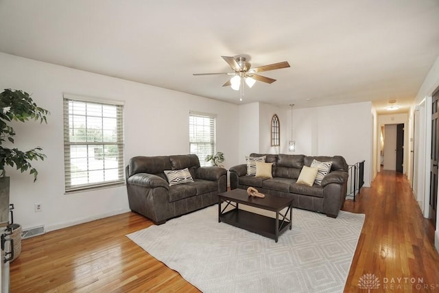 720 Boylston St, Middletown, OH 45044 - living area featuring wood finished floors, ceiling fan, and baseboards