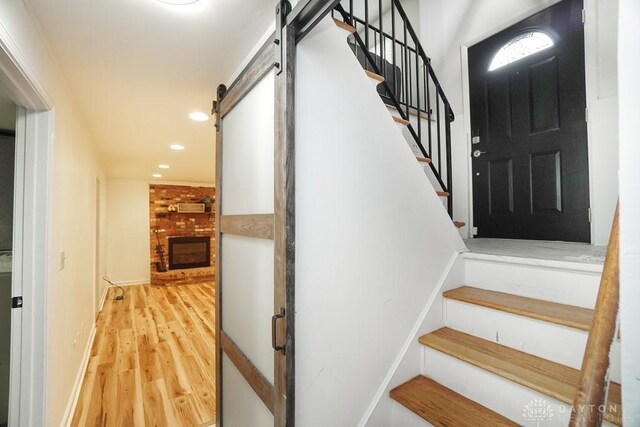 720 Boylston St, Middletown, OH 45044 - staircase featuring wood finished floors, recessed lighting, and a barn door