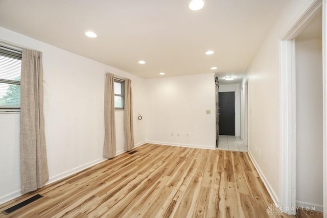 720 Boylston St, Middletown, OH 45044 - unfurnished room with healthy amount of natural light, light wood finished floors, recessed lighting, and baseboards