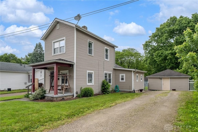 291 S W St, Xenia, OH 45385 - traditional-style house featuring a front lawn, a porch, and a chimney