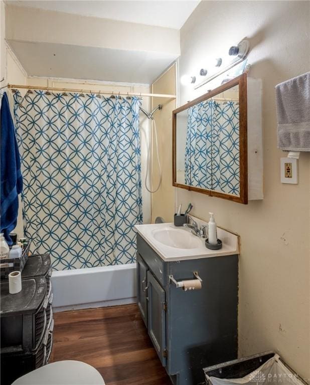 291 S W St, Xenia, OH 45385 - full bathroom featuring vanity, wood finished floors, and shower / bath combination with curtain