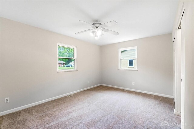 2765 Hemphill Rd, Kettering, OH 45440 - carpeted spare room with ceiling fan and baseboards