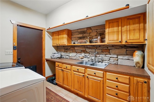 508 E Lower Springboro Rd, Clearcreek Twp, OH 45066 - kitchen with a sink, light tile patterned floors, open shelves, backsplash, and separate washer and dryer