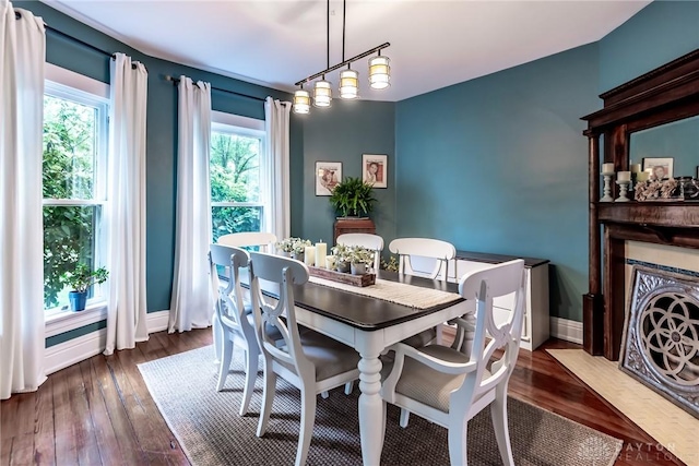 206 Wright Ave, Lebanon, OH 45036 - dining area featuring dark wood-style flooring and baseboards