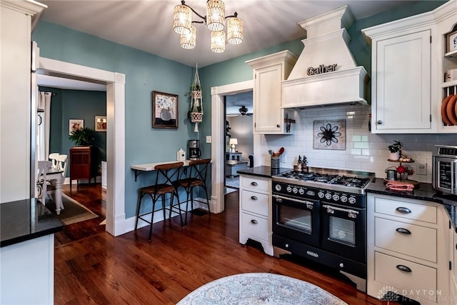 206 Wright Ave, Lebanon, OH 45036 - kitchen featuring custom range hood, double oven range, dark wood finished floors, and open shelves