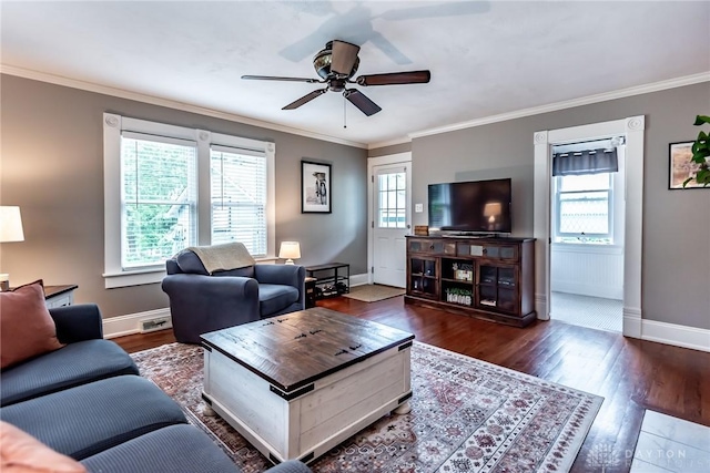 206 Wright Ave, Lebanon, OH 45036 - living area with healthy amount of natural light, ceiling fan, wood finished floors, and crown molding