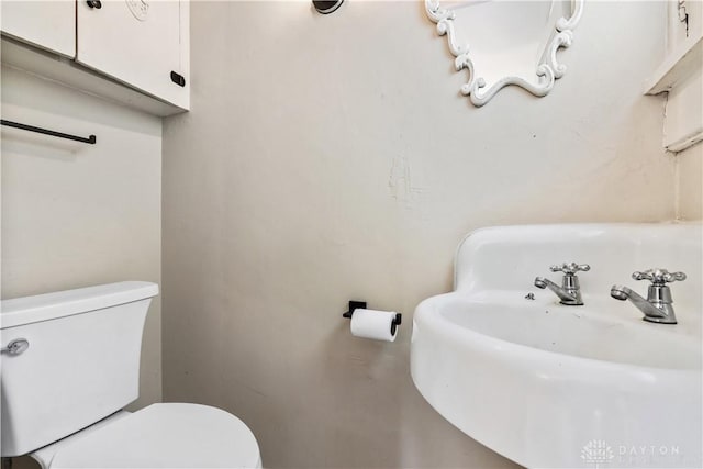 303 Hadley Ave, Oakwood, OH 45419 - half bathroom featuring toilet and a sink