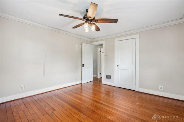 303 Hadley Ave, Oakwood, OH 45419 - unfurnished bedroom with baseboards, light wood-type flooring, ornamental molding, and a ceiling fan