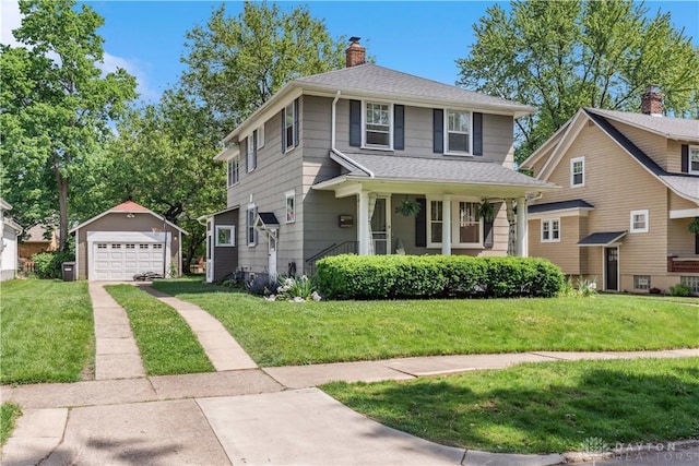 303 Hadley Ave, Oakwood, OH 45419 - american foursquare style home featuring a detached garage, an outdoor structure, concrete driveway, a porch, and a front lawn