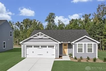 4327 Weeping Willow Dr, Dayton, OH 45424 - ranch-style house featuring an attached garage, driveway, and a front lawn